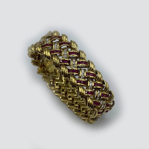 Braided bracelet with diamonds and rubies