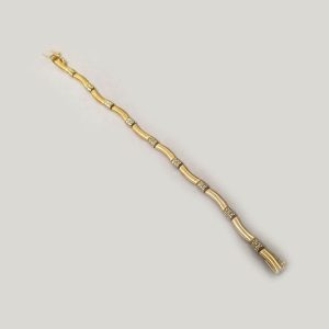 14ky Gold Two tone undulating links bracelet-polished and matte