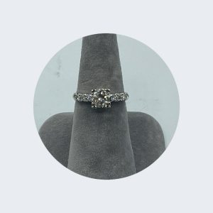 Platinum Ring with Round Diamond and 6 small Layered Diamonds