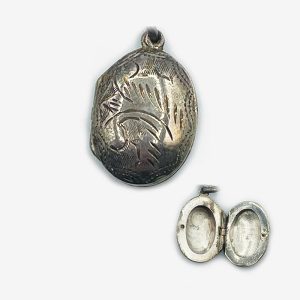 Small Silver colored Oval Locket with Foliage